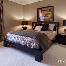 Traditional Bedroom with ceiling to floor drapes