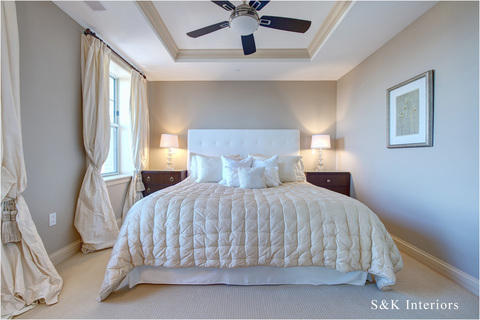 Transitional Bedroom with tray ceiling with crown moulding