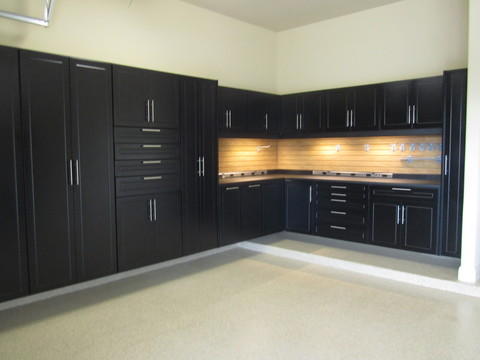 Contemporary Garage with long stainless steel cabinet pulls