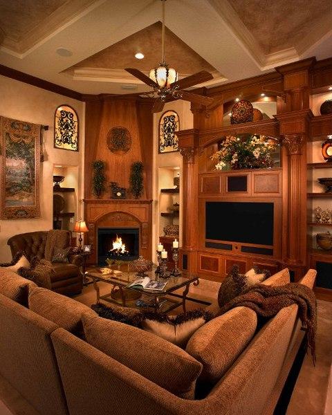 Traditional Family Room with wood fireplace surround