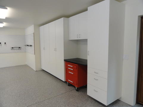 Contemporary Garage with treated poured concrete floor