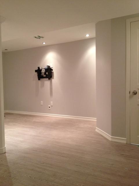 Transitional Dining Room with unfinished strip hardwood floor