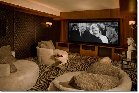 Contemporary Home Theater with padded faux leather walls
