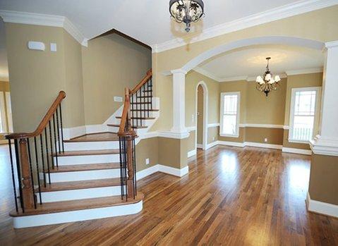 Transitional Entry with black and glass chandelierr