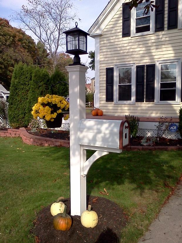 Traditional Home Exterior with lantern style outdoor light