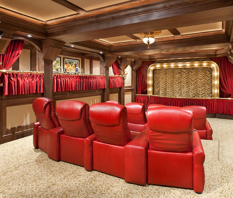 Traditional Home Theater with gold and white patterned carpet