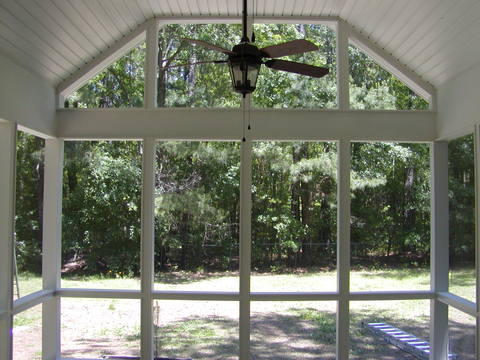 Contemporary Sunroom with painted white tongue and groove wood ceiling