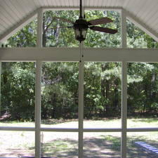 Contemporary Sunroom with painted white tongue and groove wood ceiling