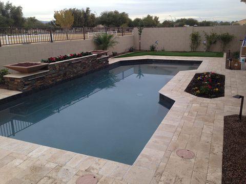 Contemporary Pool with built in stone planters