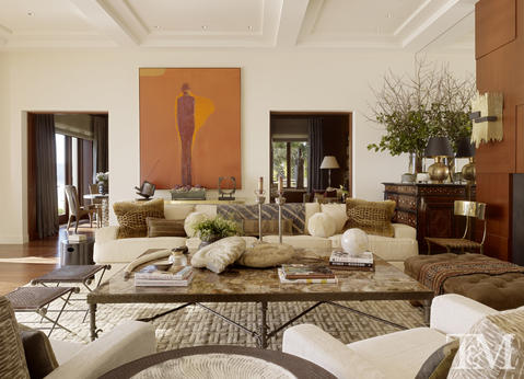 Transitional Living Room with marble top coffee table