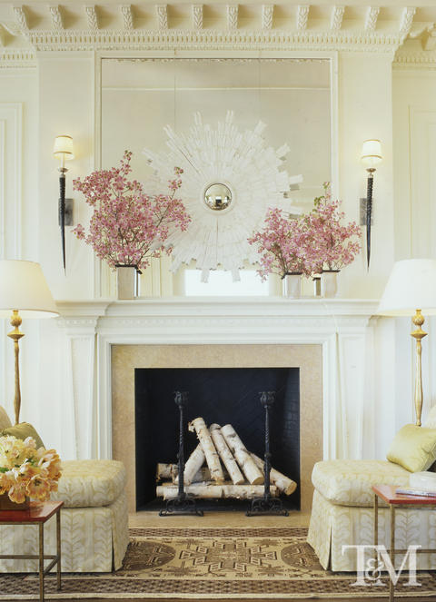 Transitional Living Room with tile work around fireplace