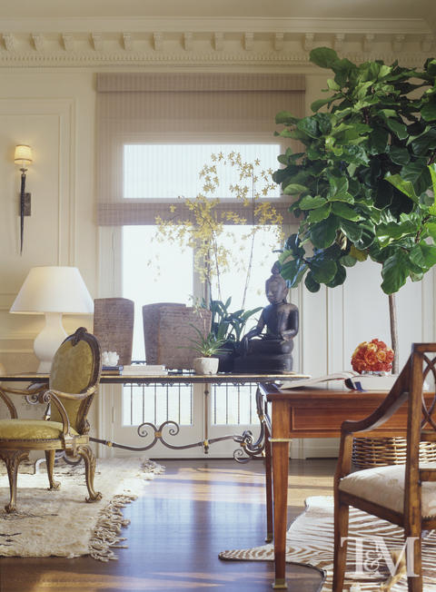 Eclectic Living Room with yellow upholstered chairs
