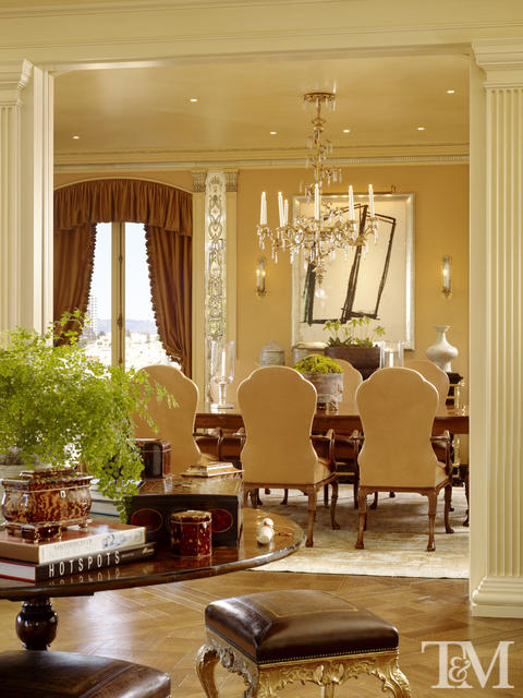 Traditional Dining Room with brass and crystal chandelier