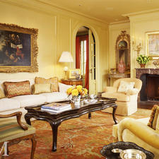 Traditional Living Room with glass top coffee table