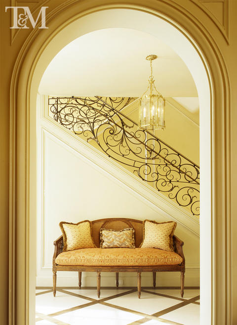 Traditional Entry with wrought iron railings