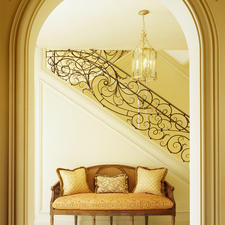 Traditional Entry with wrought iron railings