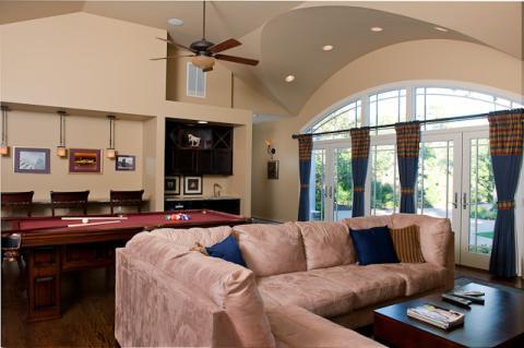 Contemporary Family Room with glass french doors to outside