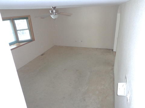 Transitional Dining Room with ceiling fan and light