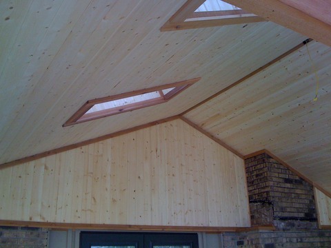 Contemporary Sunroom with natrual stained white pine