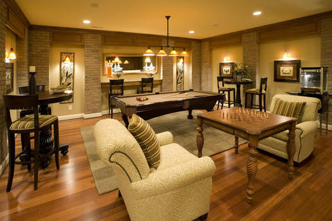 Traditional Family Room with down lighting for pictures