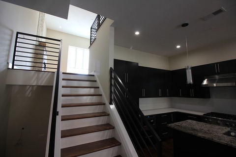 Contemporary Kitchen with gas fireplace surround