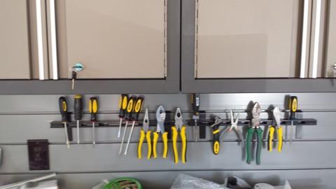 Casual / Comfortable Garage with space saver solutions for tools