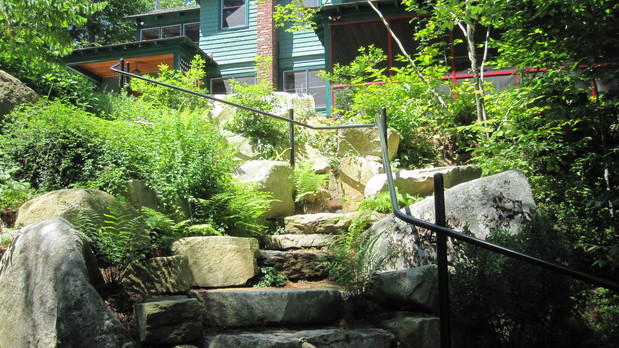 Lodge Landscape with green teal painted siding