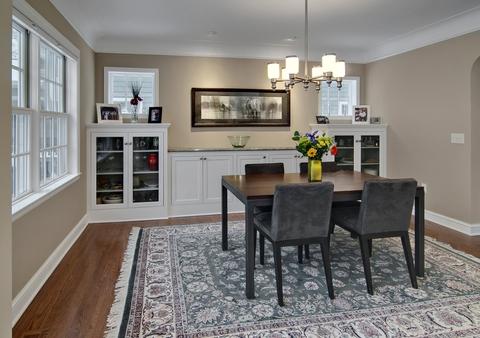 Traditional Dining Room with black dining table and chairs