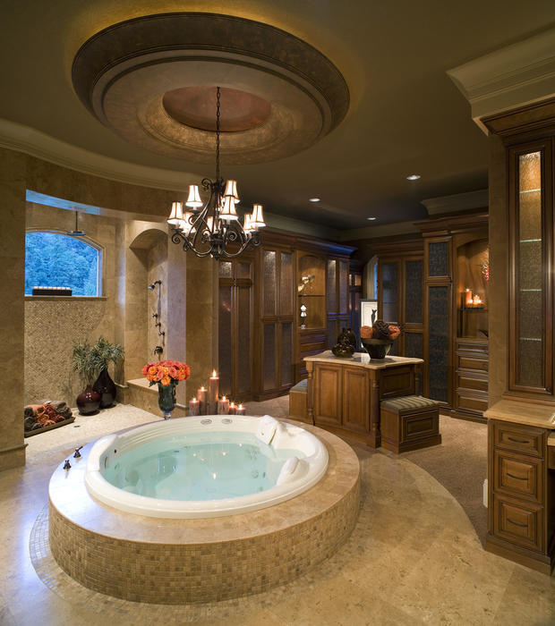 Transitional Bathroom with patterned glass cabinet doors