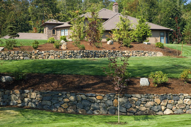 Traditional Landscape with stone retaining wall