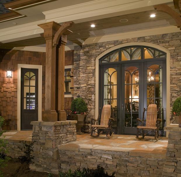 Traditional Patio with bentwood rocking charis