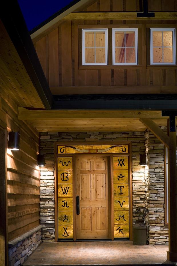Traditional Patio with stained wood front door