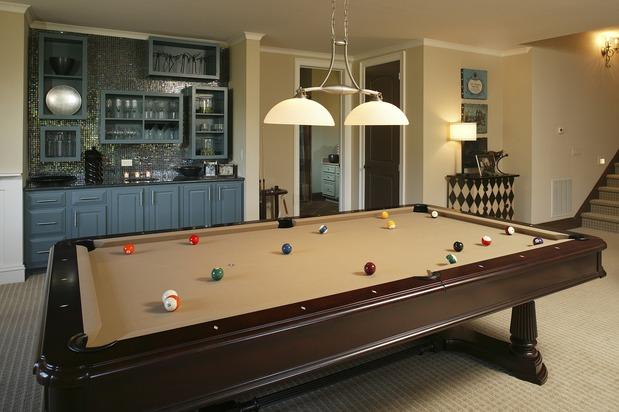 Traditional Bar with dark wood billards table