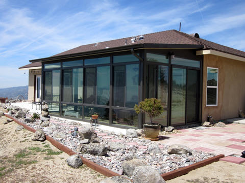 Contemporary Sunroom with full glass paneling