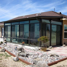 Contemporary Sunroom with full glass paneling