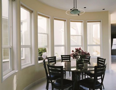 Modern Dining Room with wood and leather chairs