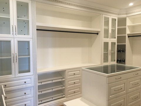 Traditional Closet with glass top accessorie closet island