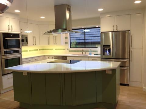 Modern Kitchen with stainless steel wall mounted microwave