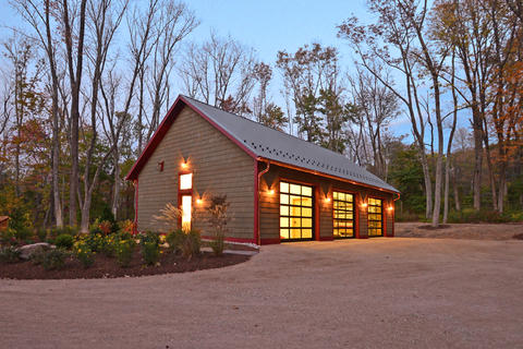 Modern Garage with windowed sectional garage door