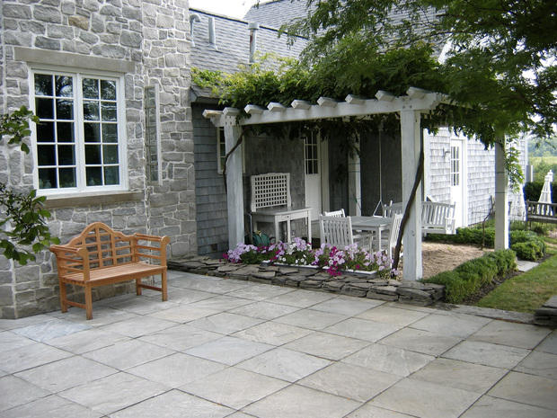 Cottage Patio with stamped and stained concrete patio