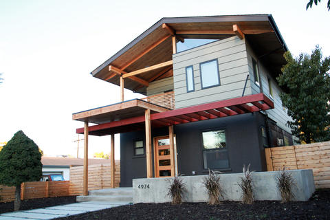 Modern Home Exterior with horizontal board privacy fence