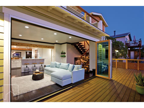 Modern Home Exterior with accordion style sliding glass door