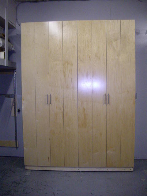 Scandinavian Bedroom with chrome cabinet handles