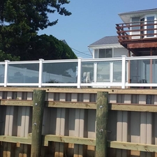 Modern Landscape with clear glass railing panels