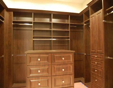 Traditional Closet with off white painted walls