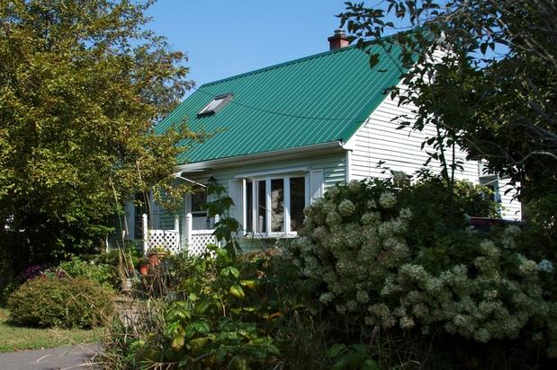 Cottage Home Exterior In Epsom Pale Mint Green Siding Metal Cottage Home Exterior With Pale Mint Green Siding
