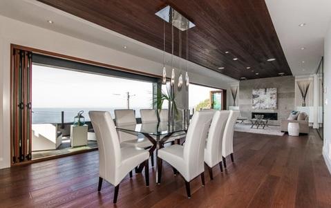 Modern Dining Room with white leather high back dining chairs