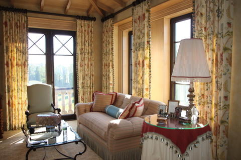 Traditional Bedroom with glass topped coffee table