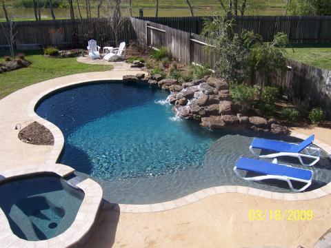 Transitional Pool with water fall into the pool