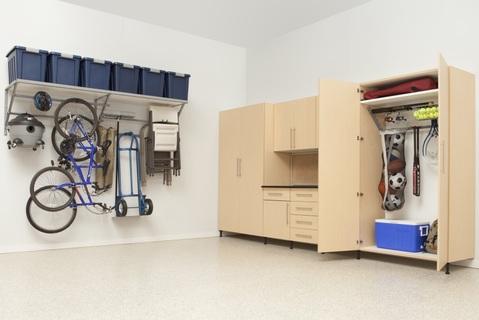 Contemporary Garage with garage slab front cabinets